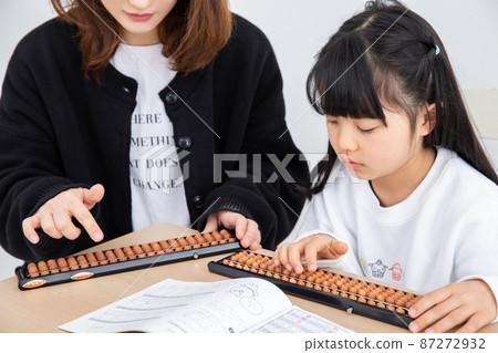 Mother and daughter learning abacus homework Mother and daughter learning abacus homework 87272932