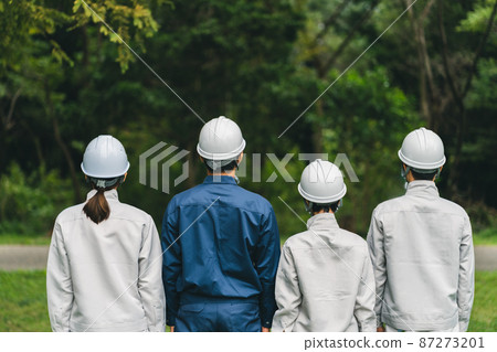 Worker wearing a helmet Worker wearing a helmet 87273201