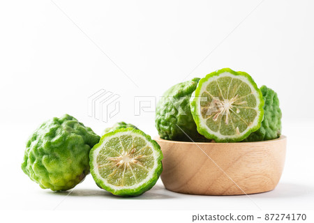 Organic Kaffir lime, Citrus fruit used in Southeast Asian cuisine  87274170
