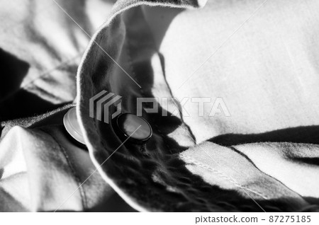 button extender shown on a white dress shirt to increase size button extender shown on a white dress shirt to increase size 87275185