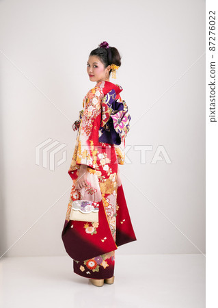 Back view of a woman wearing furisode Back view of a woman wearing furisode 87276022