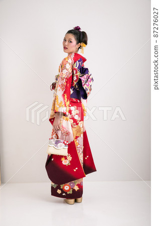 Furisode woman looking back Back view 87276027