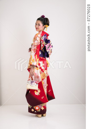 Back view of a woman wearing furisode Back view of a woman wearing furisode 87276028