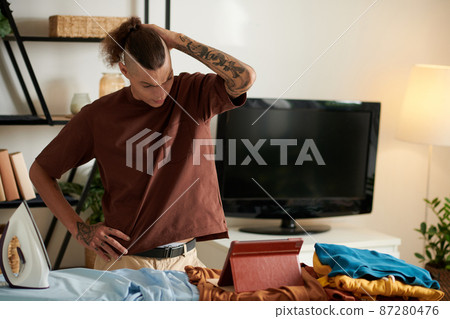 Stressed Man Working From Home 87280476