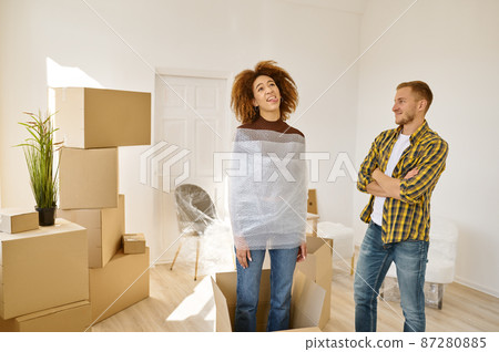 Newlyweds fooling around while moving to house Newlyweds fooling around while moving to house 87280885