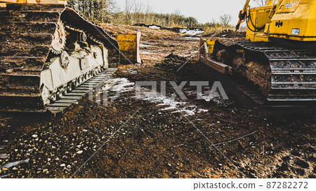 Heavy machinery in the mud and snow 87282272