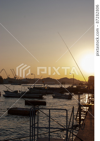 Onomichi fishing port in the evening when the sun sets soon Onomichi fishing port in the evening when the sun sets soon 87282806