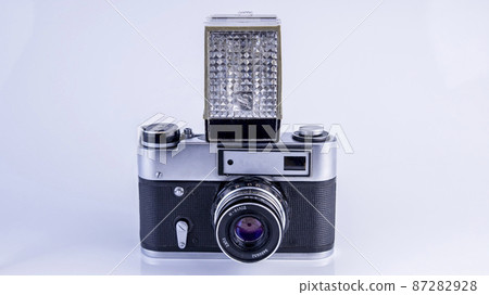 old soviet camera with flash on white background, isolated object old soviet camera with flash on white background, isolated object 87282928