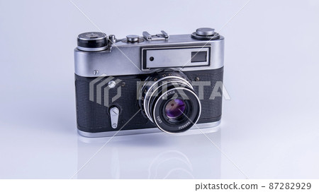 old soviet camera with flash on white background, isolated object old soviet camera with flash on white background, isolated object 87282929