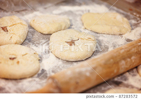 Preparation of a traditional Caucasian dish with meat - bilyash 87283572
