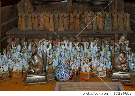 The fox is a messenger of the Inari god and is placed in the precincts as a guardian of the god. The fox is a messenger of the Inari god and is placed in the precincts as a guardian of the god. 87286692
