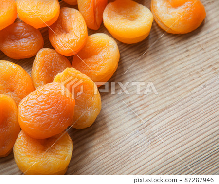 Dried fruits on a wooden table Dried fruits on a wooden table 87287946