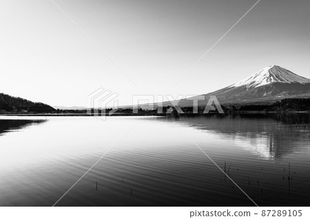 Mt. Fuji winter view from the shore of Lake Kawaguchi monochrome 87289105