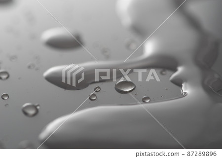 Water droplets on an acrylic board Water droplets on an acrylic board 87289896