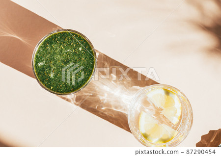 Green Smoothie, Lemon Water and Vitamins Green Smoothie, Lemon Water and Vitamins 87290454