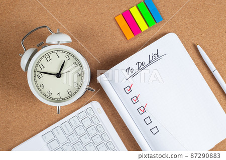 Notebook and pen with to do list words. Top view, flat lay, copy space. 87290883