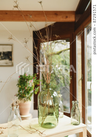 Bouquet of dried branches in a glass vase Eco decor 87291571