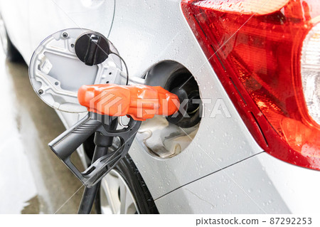 Passenger car refueling with gasoline Passenger car refueling with gasoline 87292253