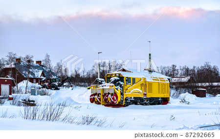 Snow plow locomotive near Abisko in Sweden 87292665