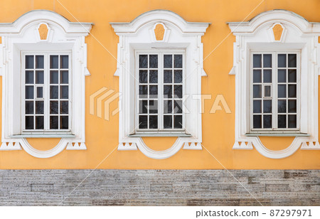 Classical architecture details, windows with white frames 87297971