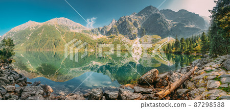 Tatra National Park, Poland. Panorama Famous Mountains Lake Morskie Oko Or Sea Eye Lake In Summer Morning. Five Lakes Valley. Beautiful Scenic View. European Nature 87298588