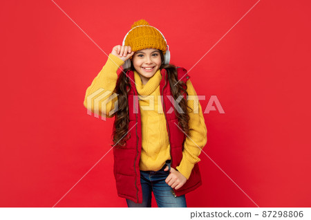happy child in hat listen music in headphones, education 87298806