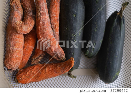 Rotten vegetables cabbage and carrot. Top view Rotten vegetables cabbage and carrot. Top view 87299452