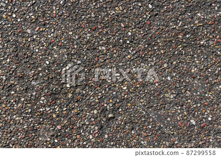 Small stone grains on the road, background material Small stone grains on the road, background material 87299558