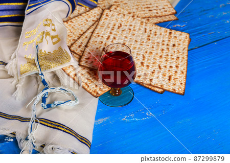 Judaism religious jewish holiday matza and cup kosher wine on passover 87299879
