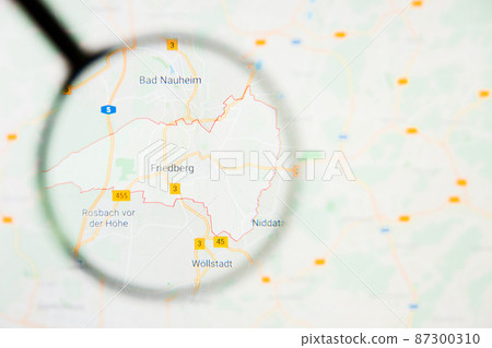 Friedberg city in Germany, Bavaria visualization illustrative concept on display screen through magnifying glass 87300310
