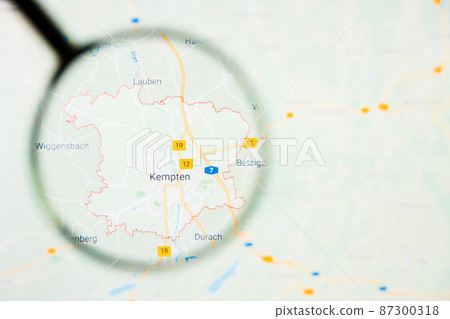 Kempten city in Germany, Bavaria visualization illustrative concept on display screen through magnifying glass 87300318