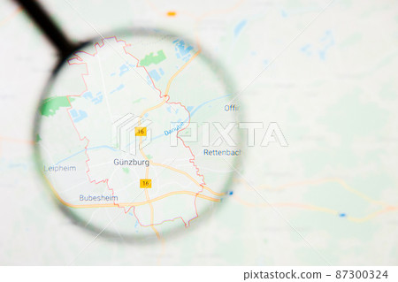 Guenzburg city in Germany, Bavaria visualization illustrative concept on display screen through magnifying glass Guenzburg city in Germany, Bavaria visualization illustrative concept on display screen through magnifying glass 87300324