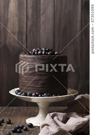 front view delicious chocolate cake concept front view delicious chocolate cake concept 87301099