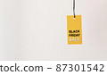 hanging yellow black friday sale label copy space 87301542
