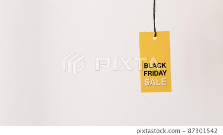 hanging yellow black friday sale label copy space 87301542