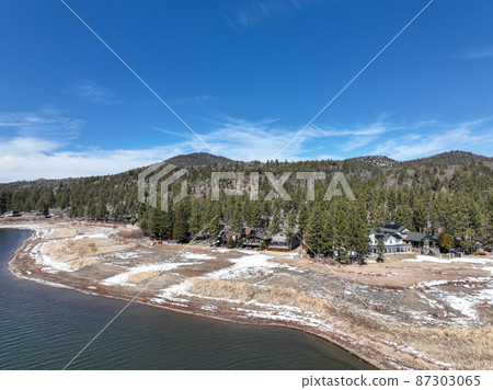 Aerial view of Big Bear Lake during winter season, San Bernardino National Forest, CA  87303065