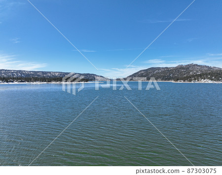 Aerial view of Big Bear Lake during winter season, San Bernardino National Forest, CA  87303075