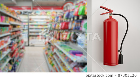 Fire extinguisher hanging on wall in shop Fire extinguisher hanging on wall in shop 87303126