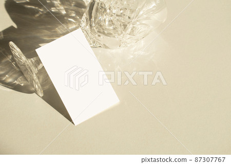 Crystal glass and business card mock-up 87307767