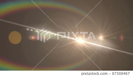 Image of white light with beam and curved prismatic lens flare on grey background Image of white light with beam and curved prismatic lens flare on grey background 87308467
