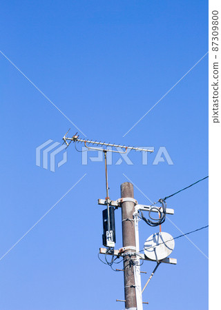 Utility pole with an antenna attached 87309800