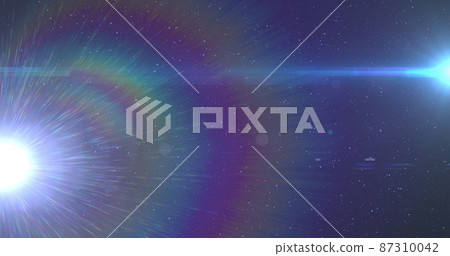 Image of glowing blue light moving over spots of light and stars in background Image of glowing blue light moving over spots of light and stars in background 87310042