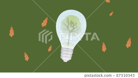 Image of lightbulb over leaves on green background Image of lightbulb over leaves on green background 87310343