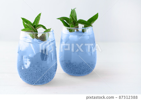 Glass of blue lagoon cocktail with curacao liqueur Glass of blue lagoon cocktail with curacao liqueur 87312388