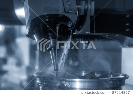 The 5-axis  machining center cutting the magnesium alloy wheel parts with solid ball endmill tool. The 5-axis  machining center cutting the magnesium alloy wheel parts with solid ball endmill tool. 87314837