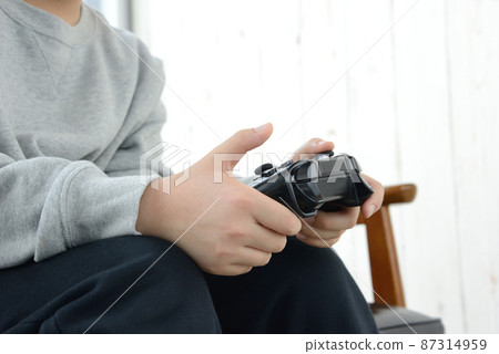 Hands of children playing games Hands of children playing games 87314959