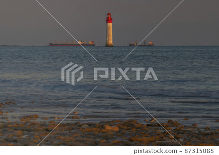 Phare de Chauvea near Ile de Re with ships to La Rochelle, Pays de la Loire, France Phare de Chauvea near Ile de Re with ships to La Rochelle, Pays de la Loire, France 87315088