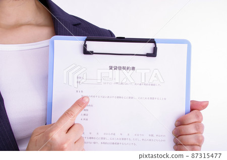 Woman with a lease agreement 87315477