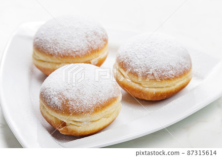donuts filled with apricot jam 87315614