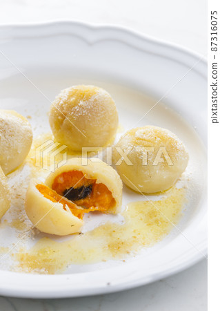 sweet dumplings filled with apricots sweet dumplings filled with apricots 87316075